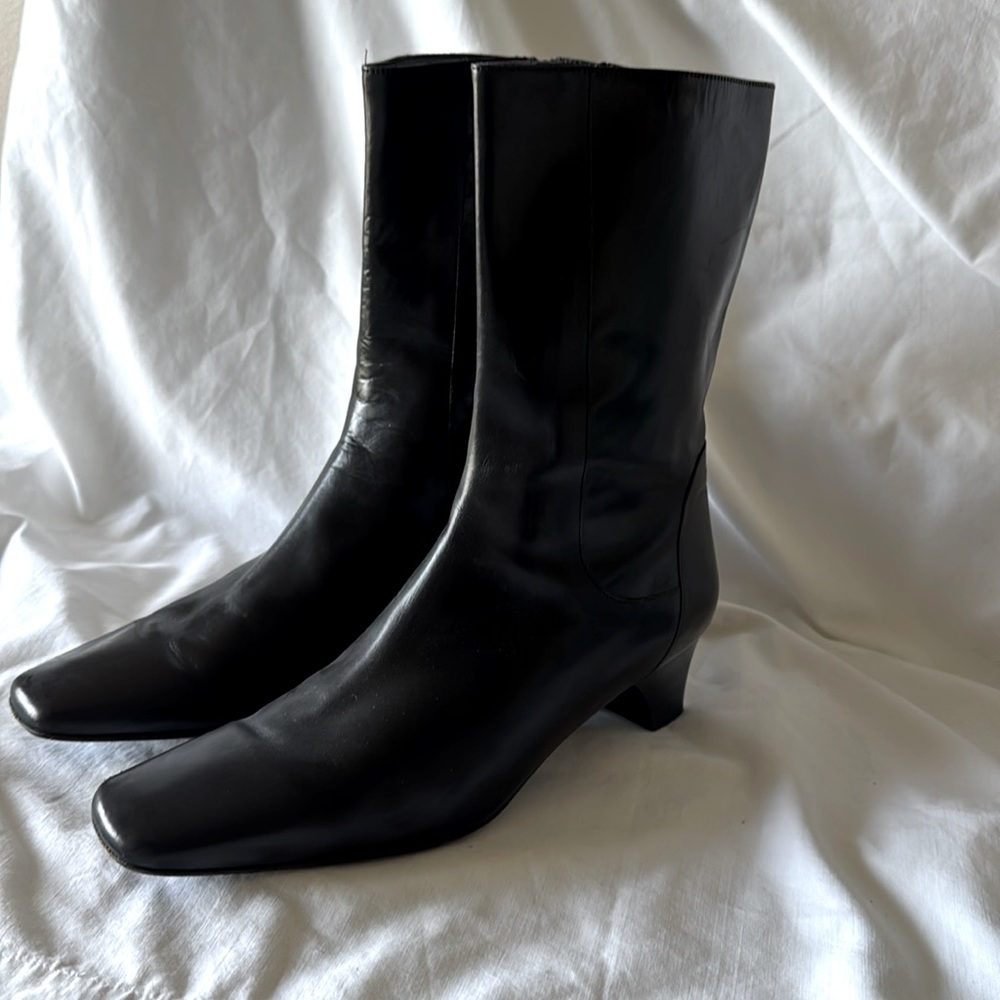 Cole Haaan black leather boots.